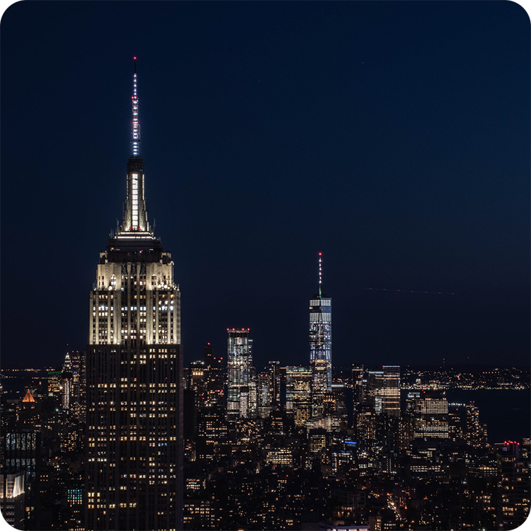 Empire State Building and Manhattan skyline at night