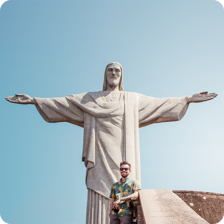 Lucas at Christ the Redeemer base in Rio de Janeiro